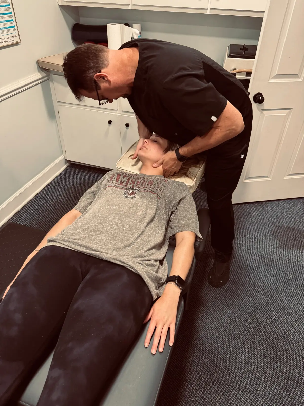 Dr. John Bracey providing individualized chiropractic care